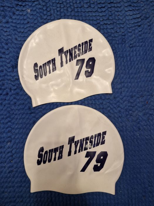 Шапочки для плавання