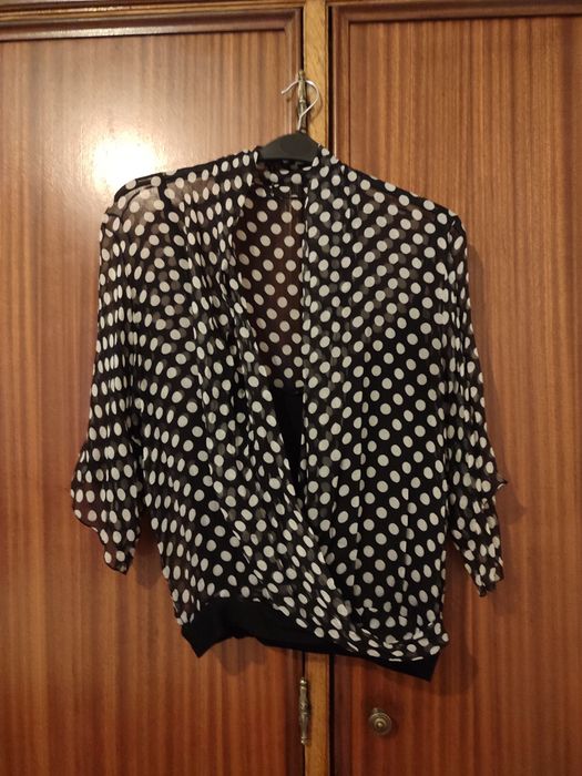 Blusas em segunda mão