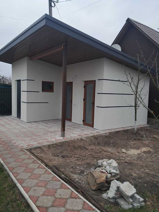 Утеплення будинку  та облаштування сайдингом