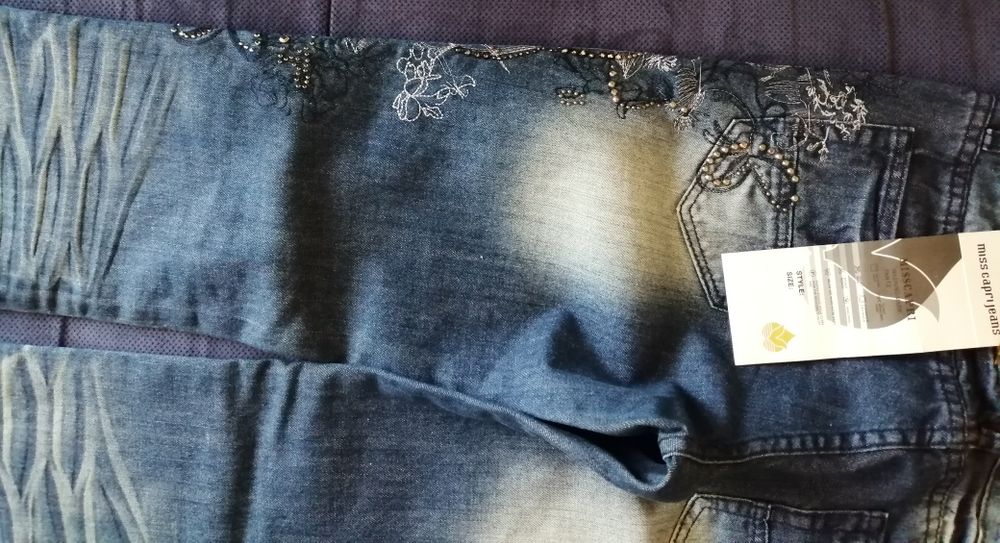 Nowe spodnie jeansy 40
