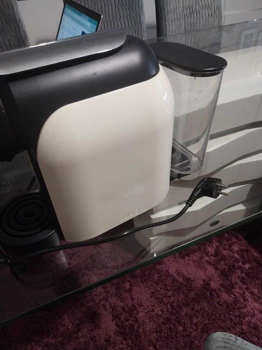 Maquina de café Delta Q com necessidade de arranjo