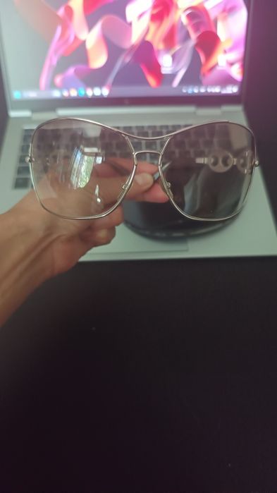 Очки от бренда Gucci