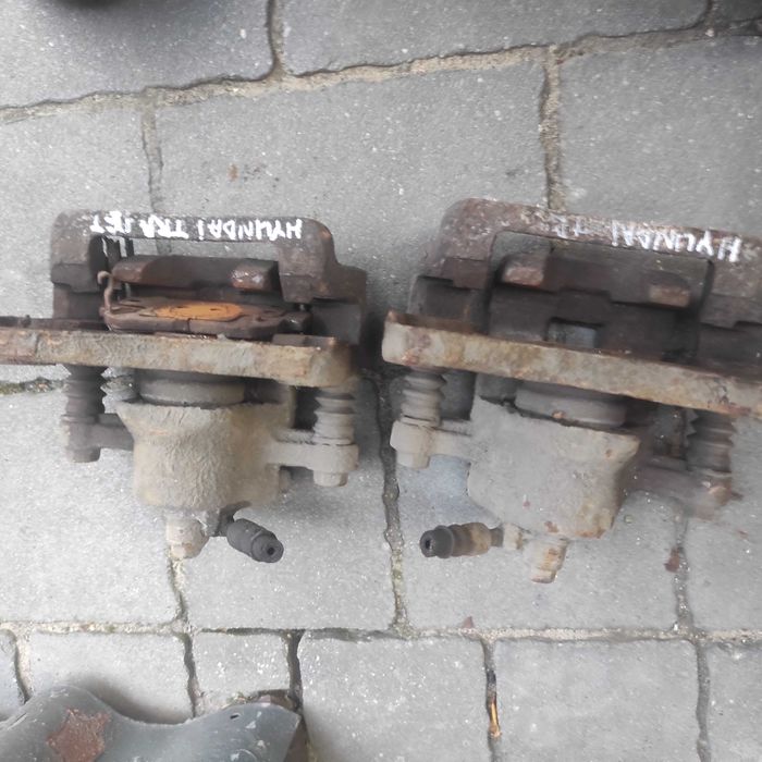 Zacisk zaciski hamulcowe prawy lewy KOMPLET Hyundai Trajet 20, CRDI