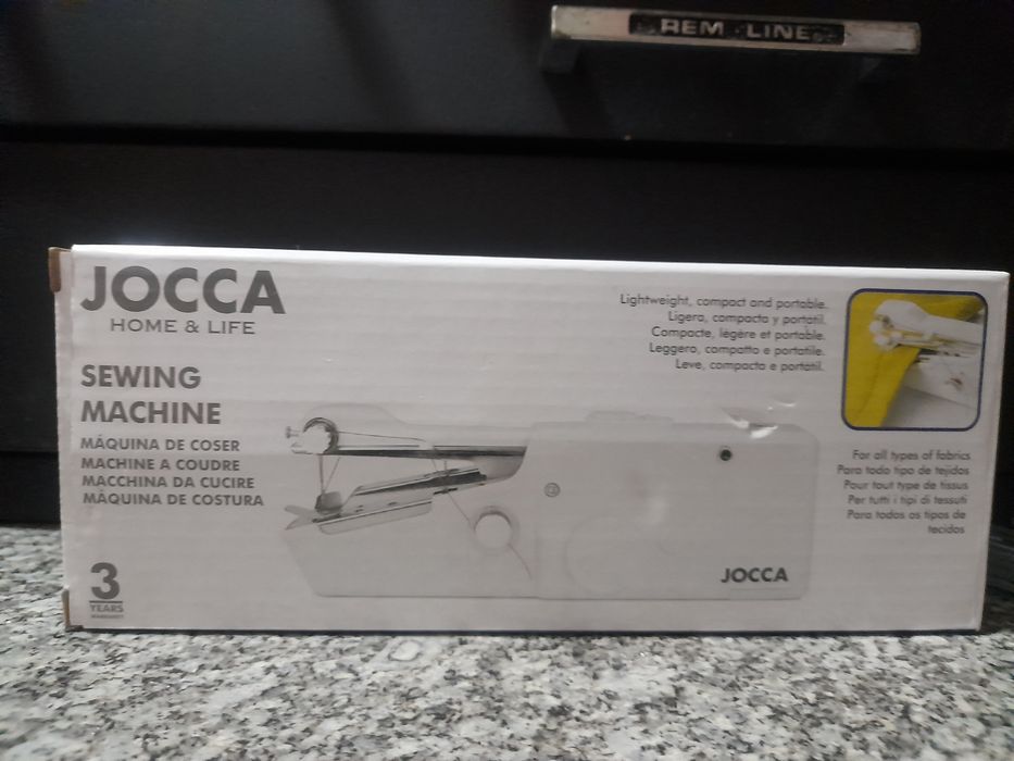 Maquina de costura á mão