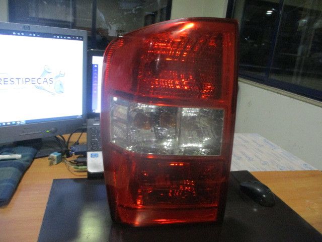 Farolim esquerdo KIA Carnival / Grand Carnival III (VQ)