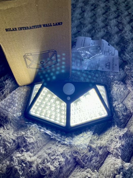 Ліхтар 100 LED на сонячній батареї з датчиком рухуЛампаБлекаут