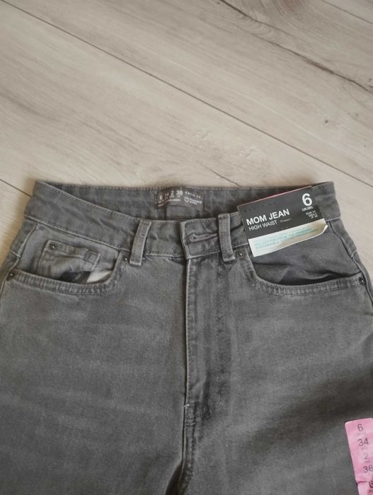 Nowe spodnie jeansowe dla dziewczyny roz 34