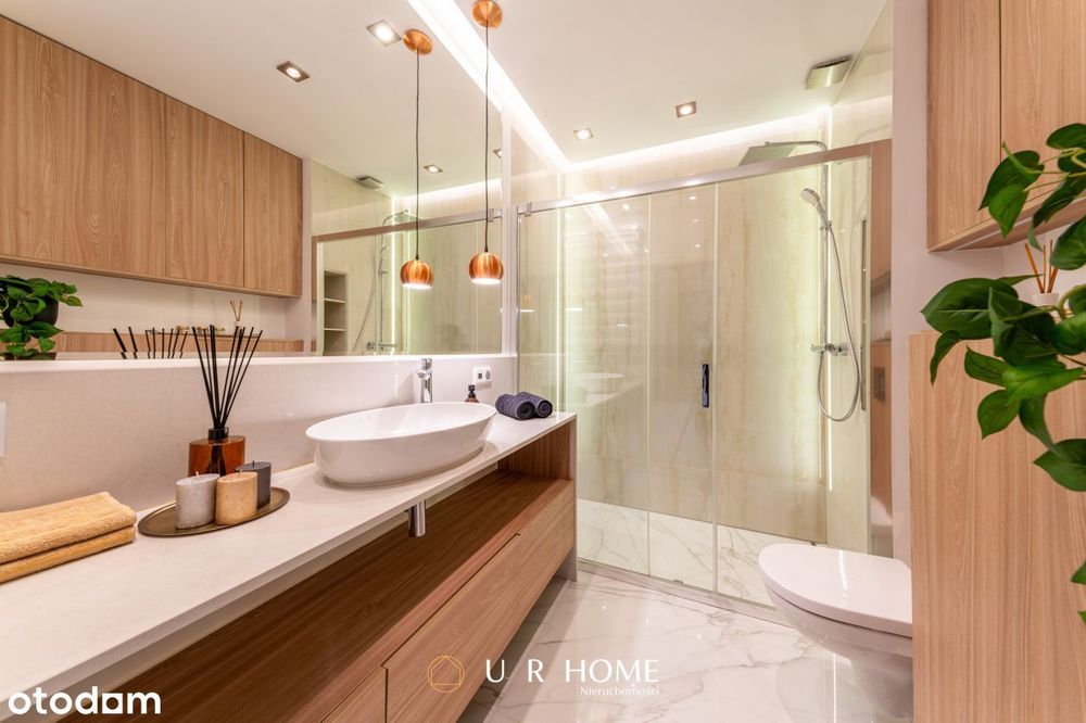 Elegancki apartament z garderobą, garażem i komórk