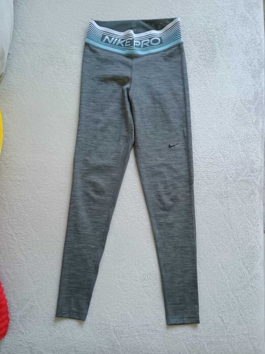 Damskie legginsy treningowe Nike PRO CJ3713.068 - rozmiar S, szare
