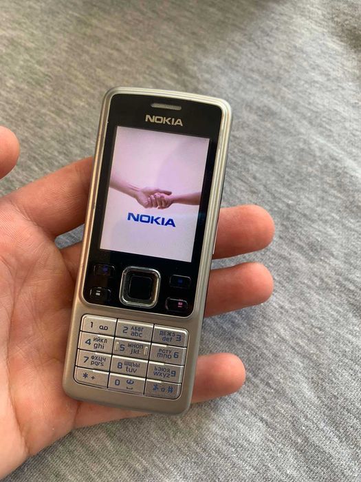 Nokia 6300 новый телефон с комплектом 1020 мАч (оригинальный)