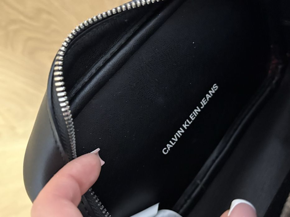 Listonosza Calvin Klein