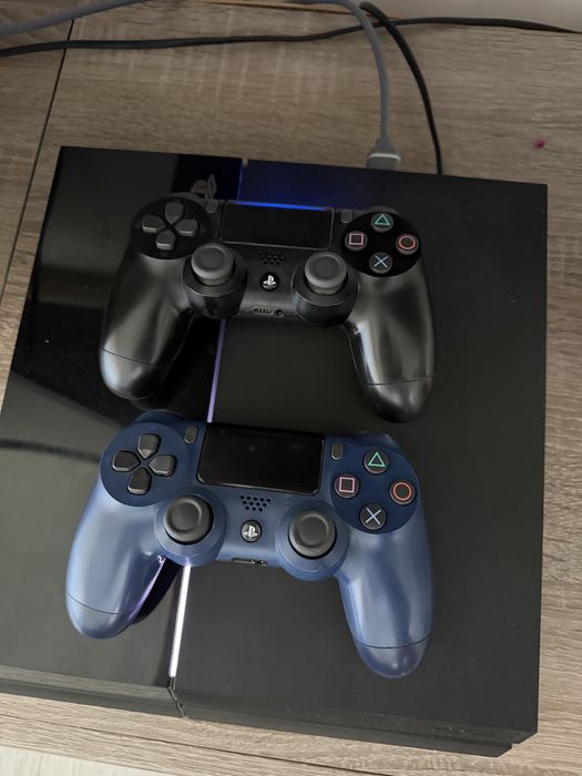 PS4 2 pady + 8 gier
