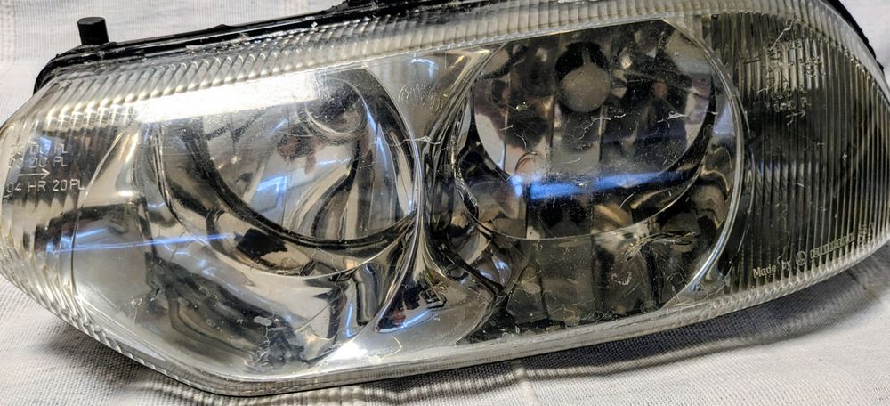 Farol frontal esquerdo Alfa Romeo 156