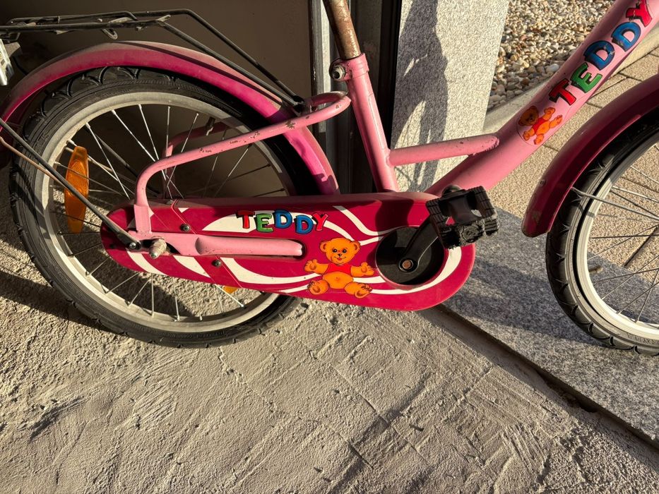 Bicicleta rosa infantil
