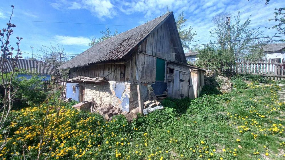 Земельна ділянка з будинком