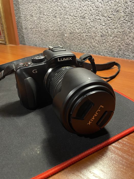 Panasonic Lumix G3 (16 Мп, Full HD)