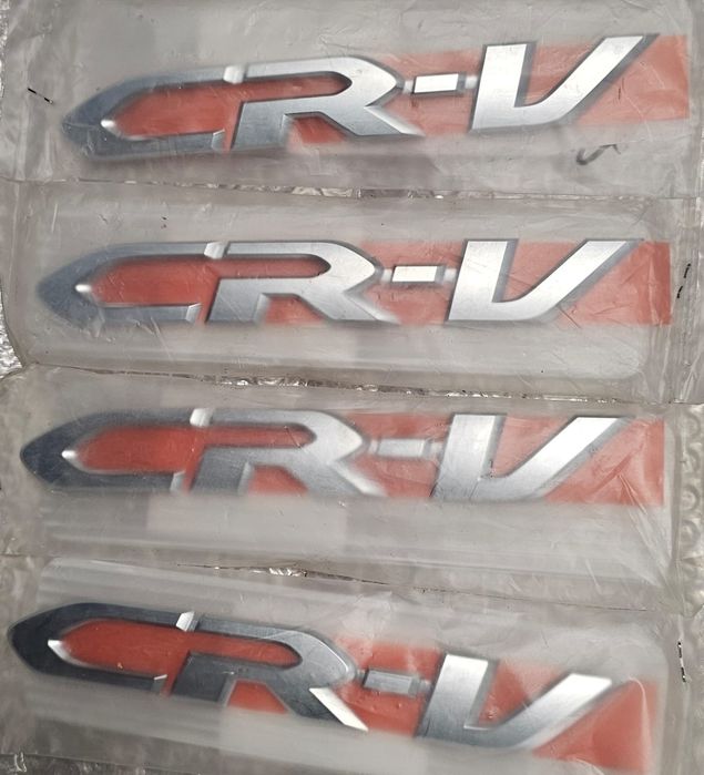 75722-T0A-003 embelmat znaczek klapy Honda CRV CR-V