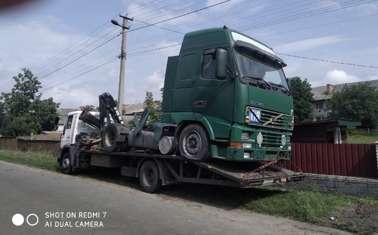 Великий вантажний евакуатор з потужним краном/маніпулятором на  10тон