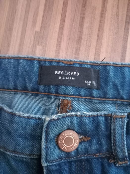 Spodnie jeansowe Reserved 38