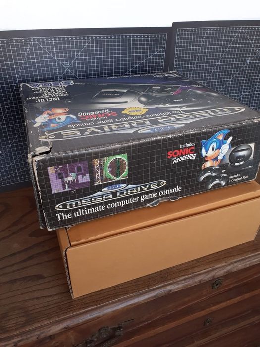 Sega Mega Drive. In original box with 2 controllers, RF cable, and Sonic64169620105601123