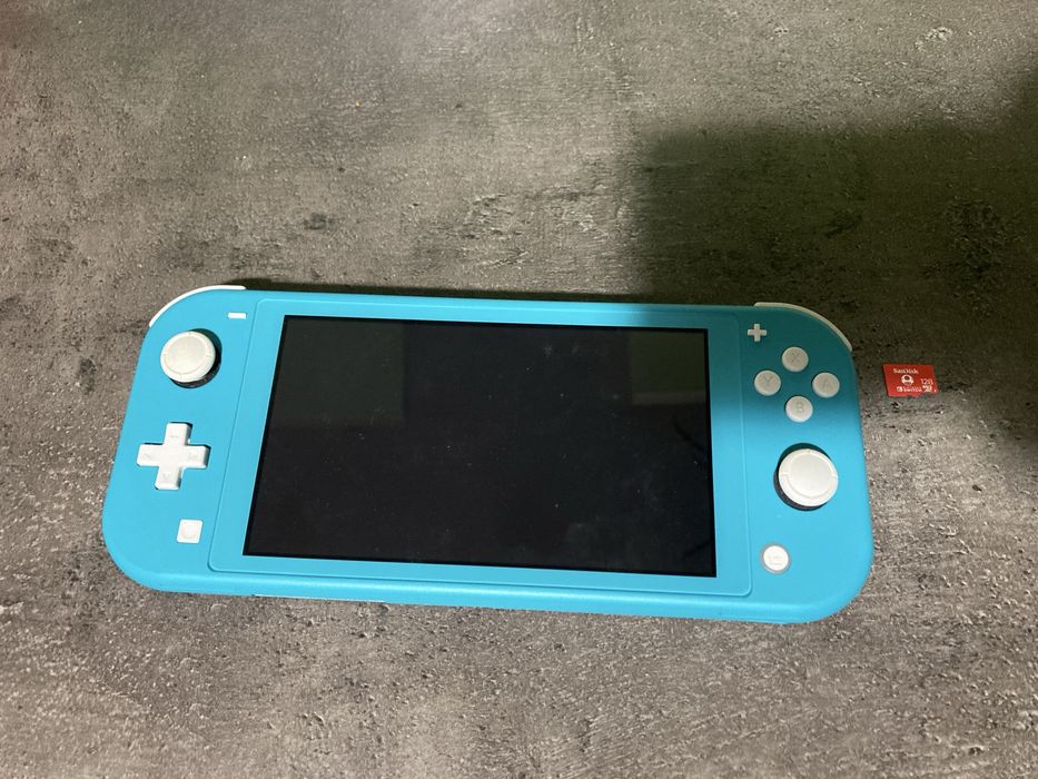 Nintendo Switch Lite 128 GB * stan jak nowy * oryginalna ladowarka *