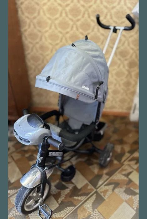 Велосипед с ручкой родительской