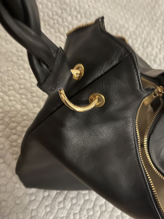 Шкіряна сумка на плетеній ручці