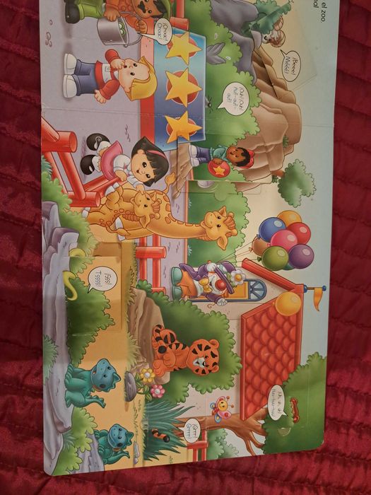 Livro Infantil "Um dia no jardim Zoológico"