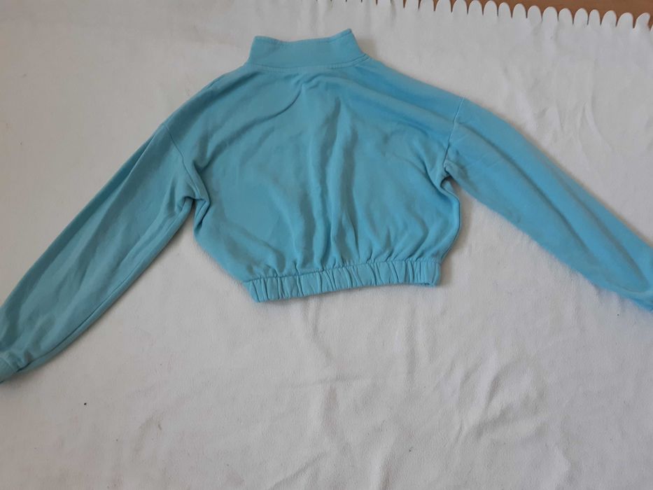 Turkusowa bluza krótka bomberka H&M r.134-140