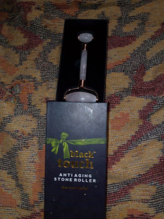 Ролик для массажа лица