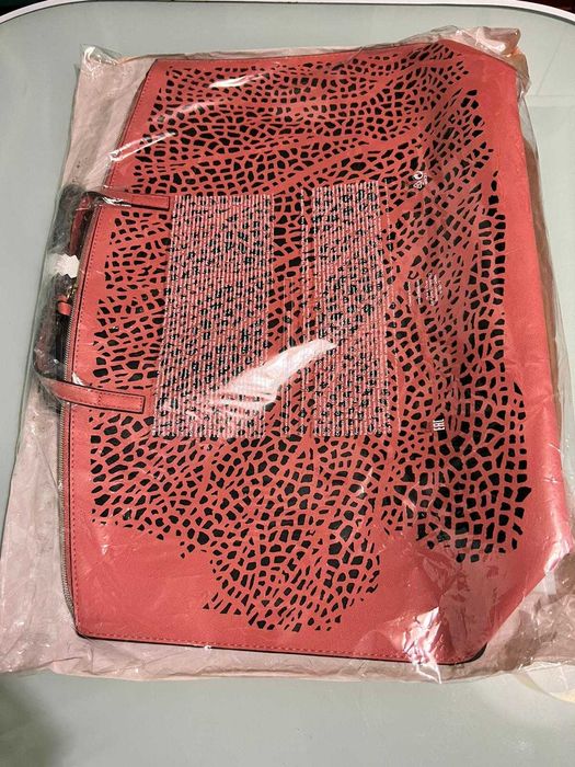 Mala Coral, cortada a laser