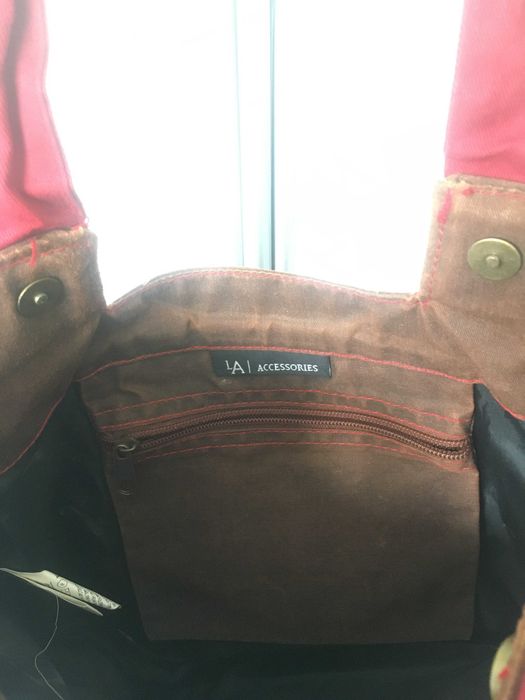 Mala castanha e vermelha da Lanidor