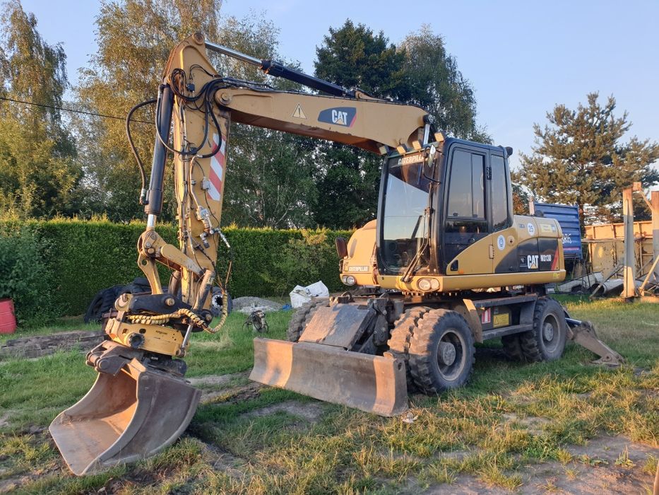 Koparka transport wyburzenia rozbiórki budowa dróg parkingów wjazdów