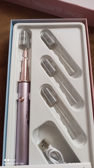 Нова електрична зубна щiтка.