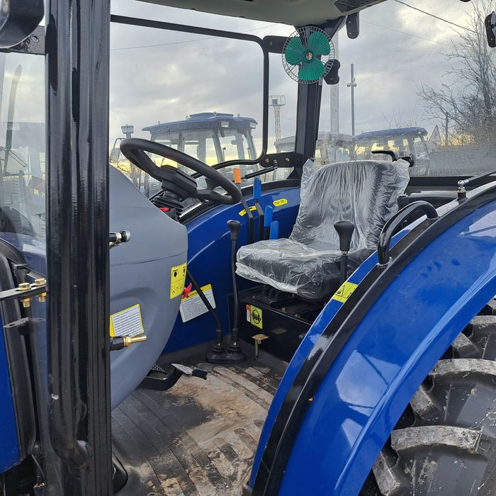 Міні трактор ДТЗ 5504НККз примусовим навісним механізмом