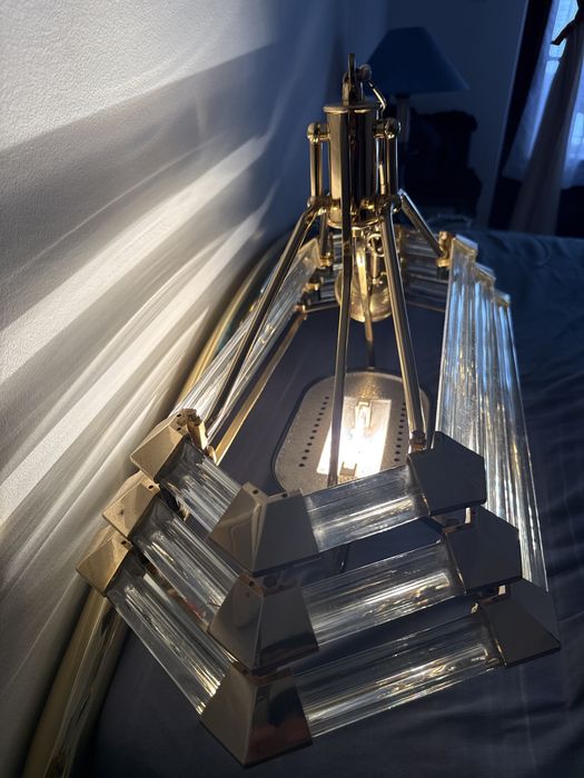 Luminaria em Metal dourado com Laminas de Vidro com detalhes Dourado.