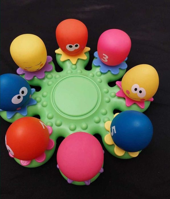 Восьминіжки іграшка для купання Tomy присоски цифри у ванній кімнаті