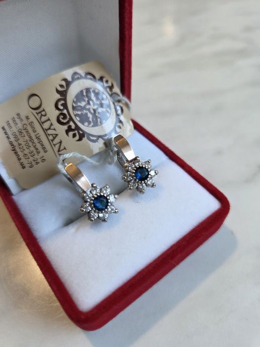 Срібні сережки с золотими пластинами.