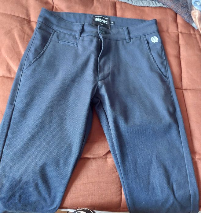 Calças  da SMK 16 anos como novas