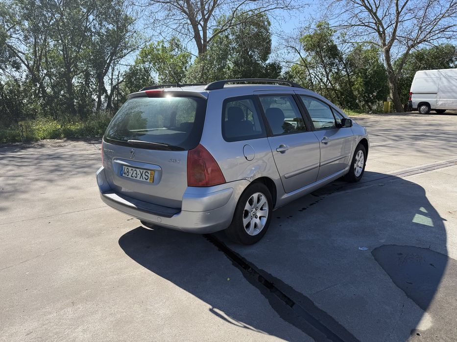 Peuogot 307 ano 2004  gasolina e gas