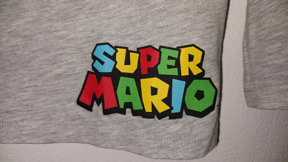 Camisola manga comprida Super Mario 
Nova
8-10 anos
Com lantejolas - S