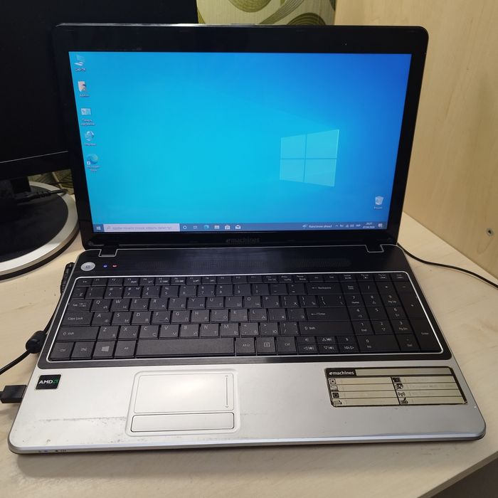 Ноутбук eMachines E440 -1202G25