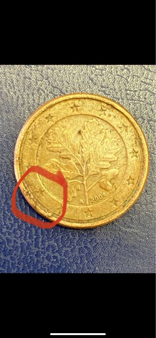 Moeda de 1 centimo com defeito