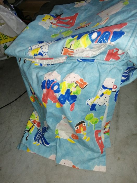 Colcha e reposteiros