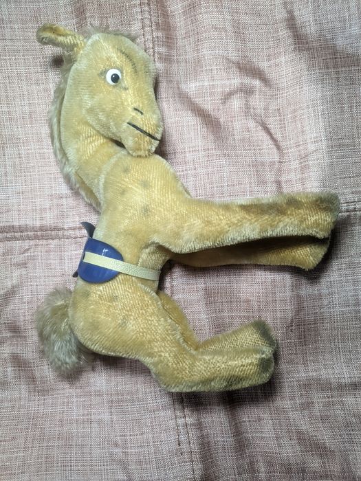 Игрушка лошадь..