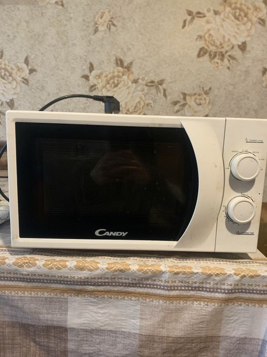 Мікрохвильова піч Candy