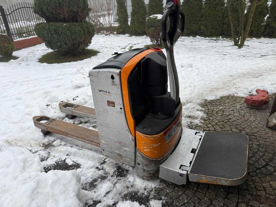 Still EXU 20 wózek widłowy paleciak z podestem 24V