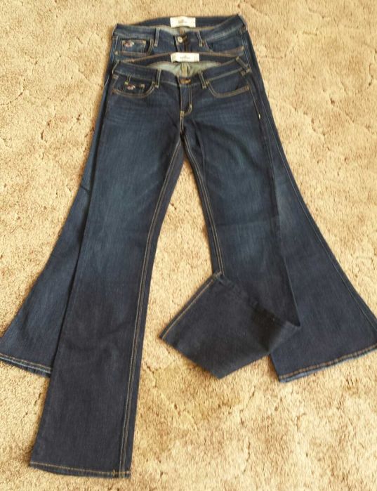 Spodnie jeans firmy Hollister dzwony.