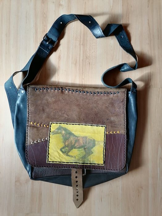 Torba skórzana na ramię, Śladem kota