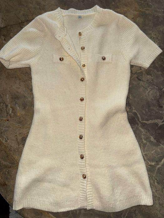 Вʼязана сукня молочного кольору